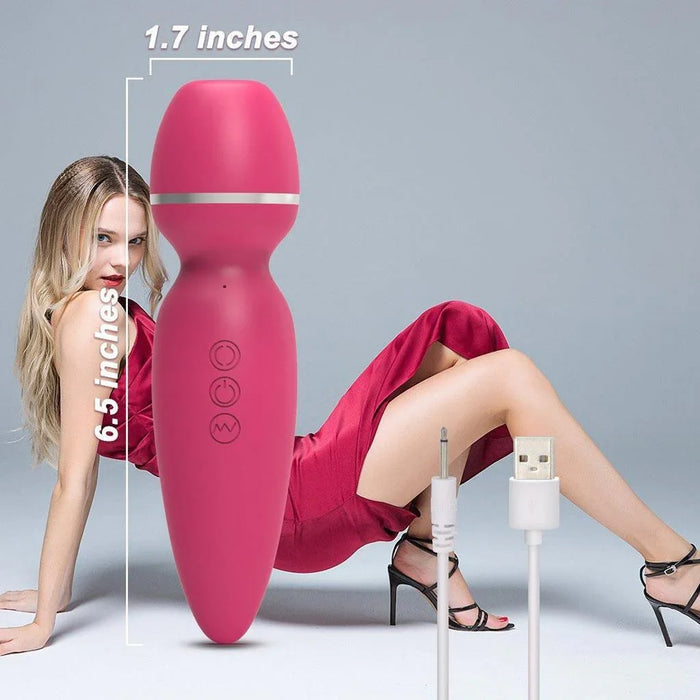 Pink 2-in-1 suction vibrator with dimensions, USB charging cable, woman in red dress background