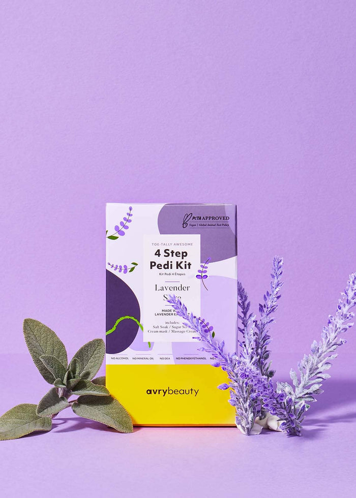 4 Step Pedi Kit packaging with lavender flowers on a purple background
