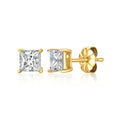 Gold stud earrings with clear gemstones on a white background