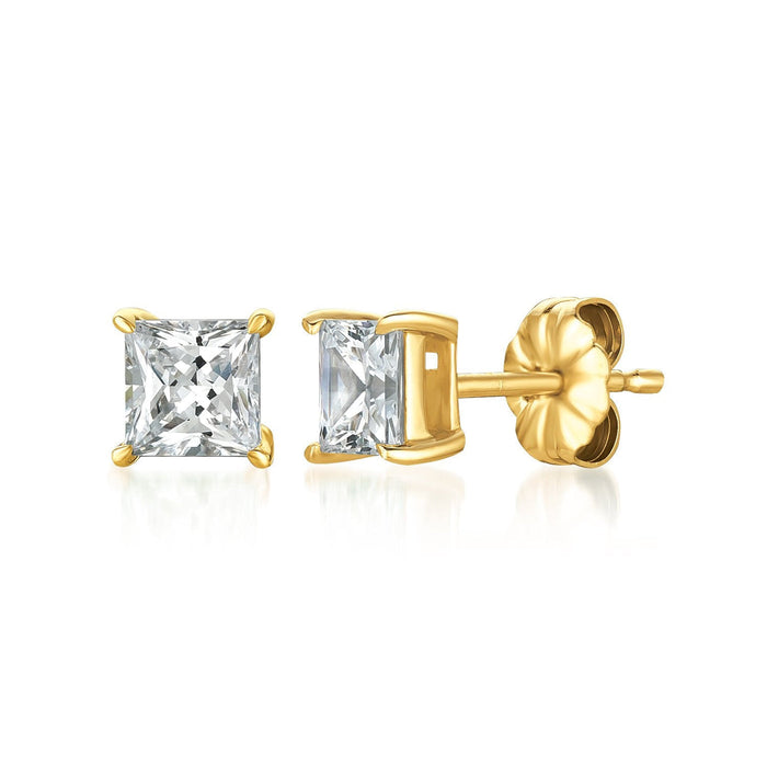 Gold stud earrings with clear gemstones on a white background