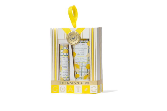 Beekman 1802 skincare set in a decorative box with yellow accents on a white background