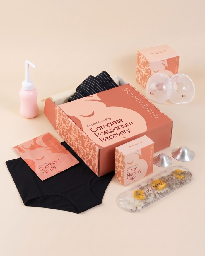 MammaBump Complete Postpartum Recovery Bundle packaging with belly band, two soothing briefs, peri bottle, perineal therapy pack, silver nursing cups, and breast milk collectors