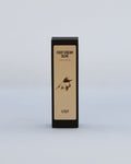 Black and tan rectangular foot cream box labeled "Foot Cream Olive" with olive branch illustration, 75 ml / 2.5 fl oz.