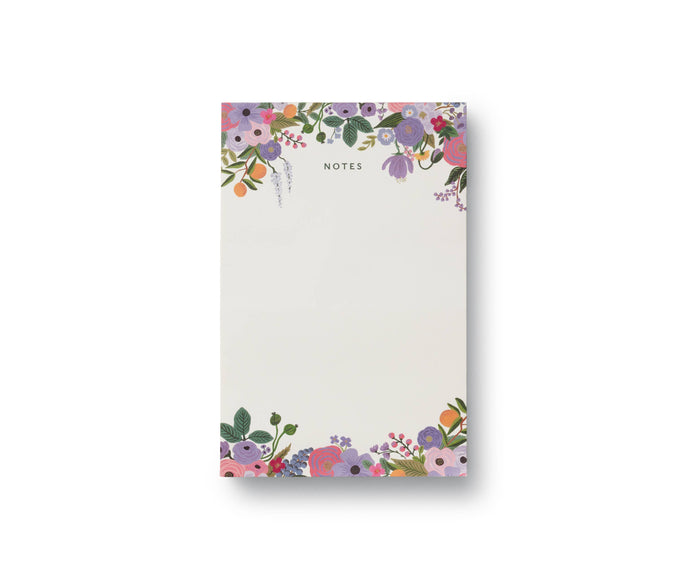 Floral notepad with decorative border on a white background