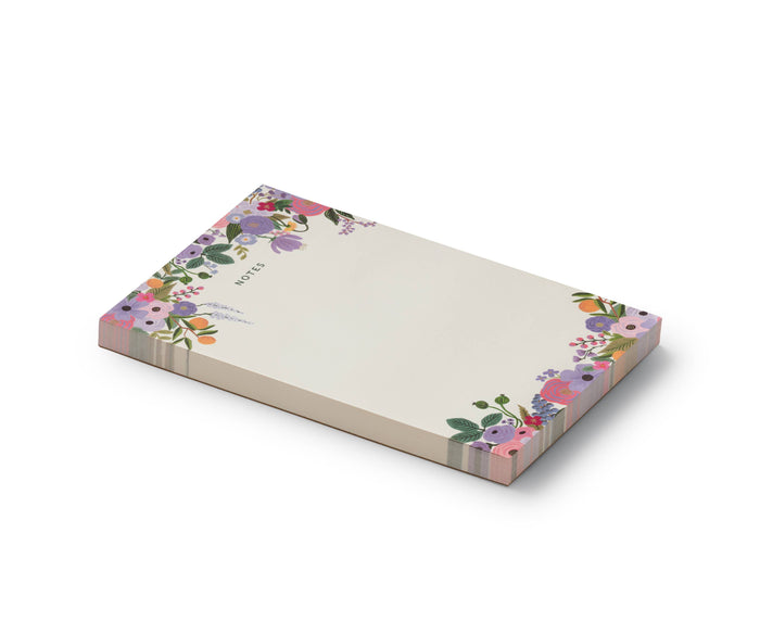 Floral notepad on a white background