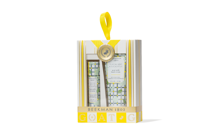 Beekman 1802 soap packaging with yellow ribbon on a white background