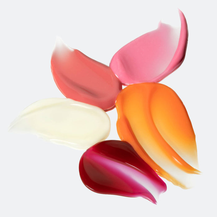Colorful lip gloss swatches on a white background