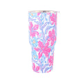 Floral-patterned tumbler on a white background