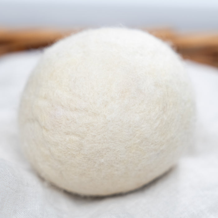 Rustic Strength: Up-close image of a single Jumbo Wool Dryer Ball