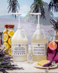 Rustic Strength - Laundry Refill Bundle | Lavender & Lemon (Lavender Lemon scented Laundry Detergent, Tallow Fabric Softener and Linen Spray) with sliced lemons and a bundle of lavender