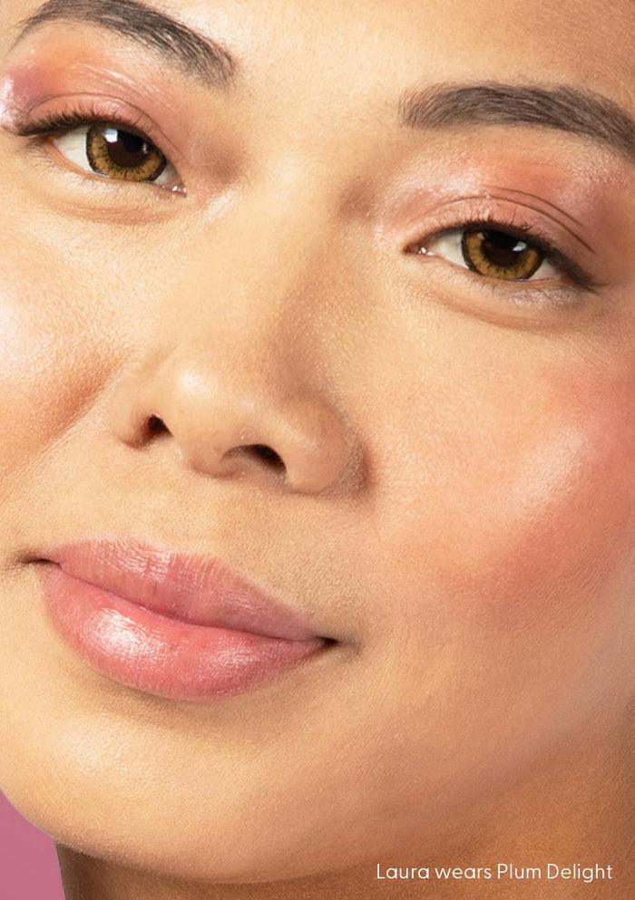 Close-up of a person's face with makeup, specifically around the eyes and cheeks.