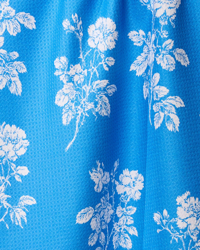Blue fabric with white floral pattern
