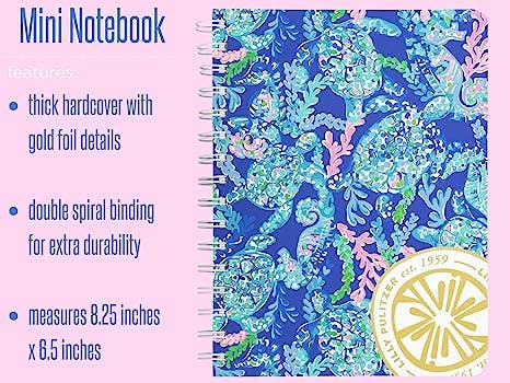 Mini notebook with seahorse pattern and gold foil details on a pink background