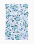 Floral patterned towel with blue flowers on a white background