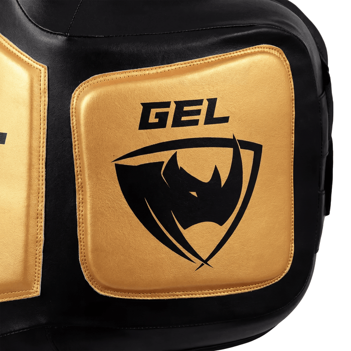 PROLAST Platinum gel boxing body protector in black and gold, close-up of a gold GEL side pad with the rhino logo