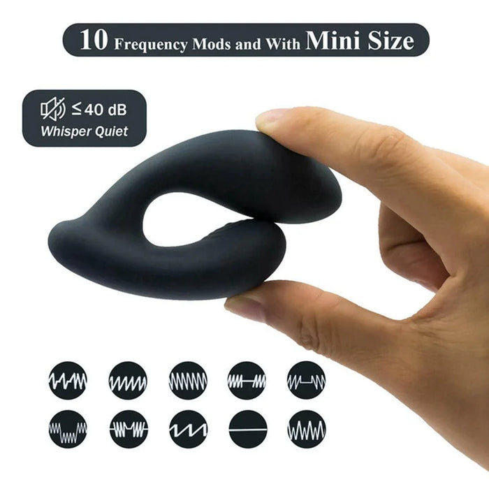Hand holding black remote control silicone massager, mini size, 10 vibration modes, whisper quiet.