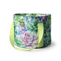 A foldable canvas gardening bucket with a floral pattern and pink handles, displayed alongside close-up views of the bucket's floral design.