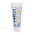 Tube of Cait + Co Shea Butter Body Cream with colorful gem-inspired design on the packaging