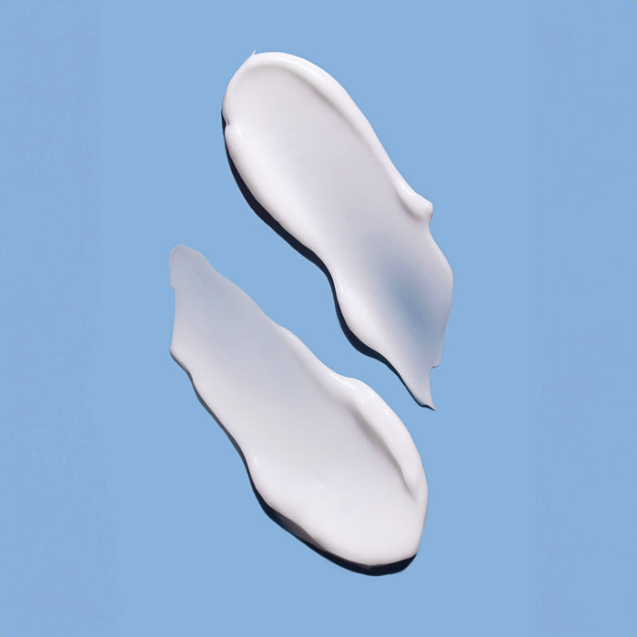 cosmetic sample against a blue background