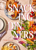Book cover of 'Snacking Dinners' with plates of food and vegetables on a beige background.