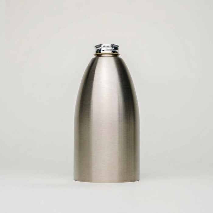 Rustic Strength, A 16oz brushed stainless steel bottle with a screw-on metal cap, centered against a light gray studio background.