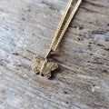 Tiny Brass Butterfly Pendant