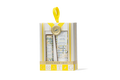 Beekman 1802 skincare set in a decorative box with yellow accents on a white background