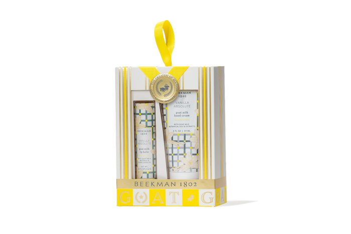 Beekman 1802 skincare set in a decorative box with yellow accents on a white background